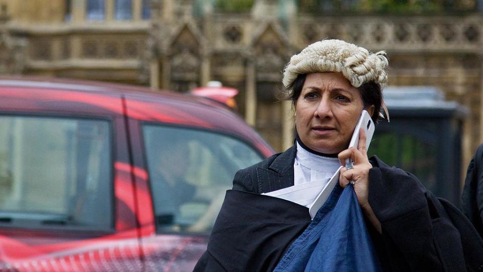 A lawyer on the streets of London. Photo by Chris Beckett via Flickr CC-BY-2.0.